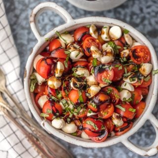Chopped Caprese Salad is the perfect easy side dish for any BBQ! Simple, delicious, and healthy! Tomato, Mozzarella, Basil, and Balsamic Vinegar. A family favorite!