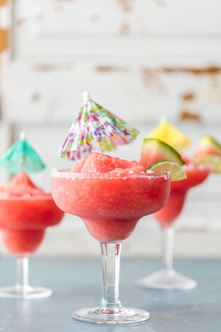 A Frozen Watermelon Margarita is just what you need for Cinco de Mayo! The best easy margarita all thrown together in a blender and ready to serve. SO REFRESHING!