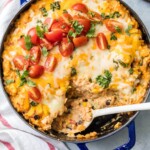 You family will love this ENCHILADA STUFFED PEPPER CASSEROLE, an easy weeknight meal so delicious and full of flavor! Customize with your favorite ingredients to make it your own. AMAZING!