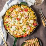 It doesn't get better than ONE POT CHICKEN ALFREDO SKILLET! Creamy one pan Chicken Alfredo made in a skillet tossed with sun dried tomatoes! BEST DINNER EVER.