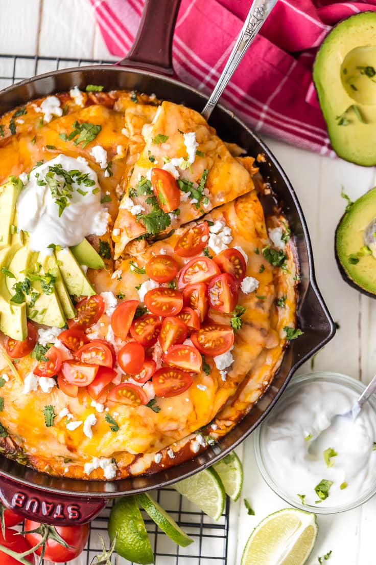 EASY DINNER ALERT! Chicken Enchilada Skillet Pie is made in my 25 minutes and will satisfy the entire family. Flour tortillas layered with spicy chicken, enchilada sauce, and lots of cheese. Easy and delicious dinner perfect for busy nights.