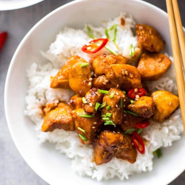 Bourbon Chicken is one of our favorite easy Chinese Takeout meals to make at home on busy nights. This Bourbon Chicken Recipe is the best sweet and spicy chicken recipe, with the best bourbon chicken sauce. Even better, you can make it in minutes! So much flavor and so little fuss!