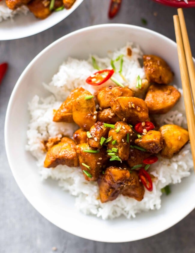 Bourbon Chicken is one of our favorite easy Chinese Takeout meals to make at home on busy nights. This Bourbon Chicken Recipe is the best sweet and spicy chicken recipe, with the best bourbon chicken sauce. Even better, you can make it in minutes! So much flavor and so little fuss!