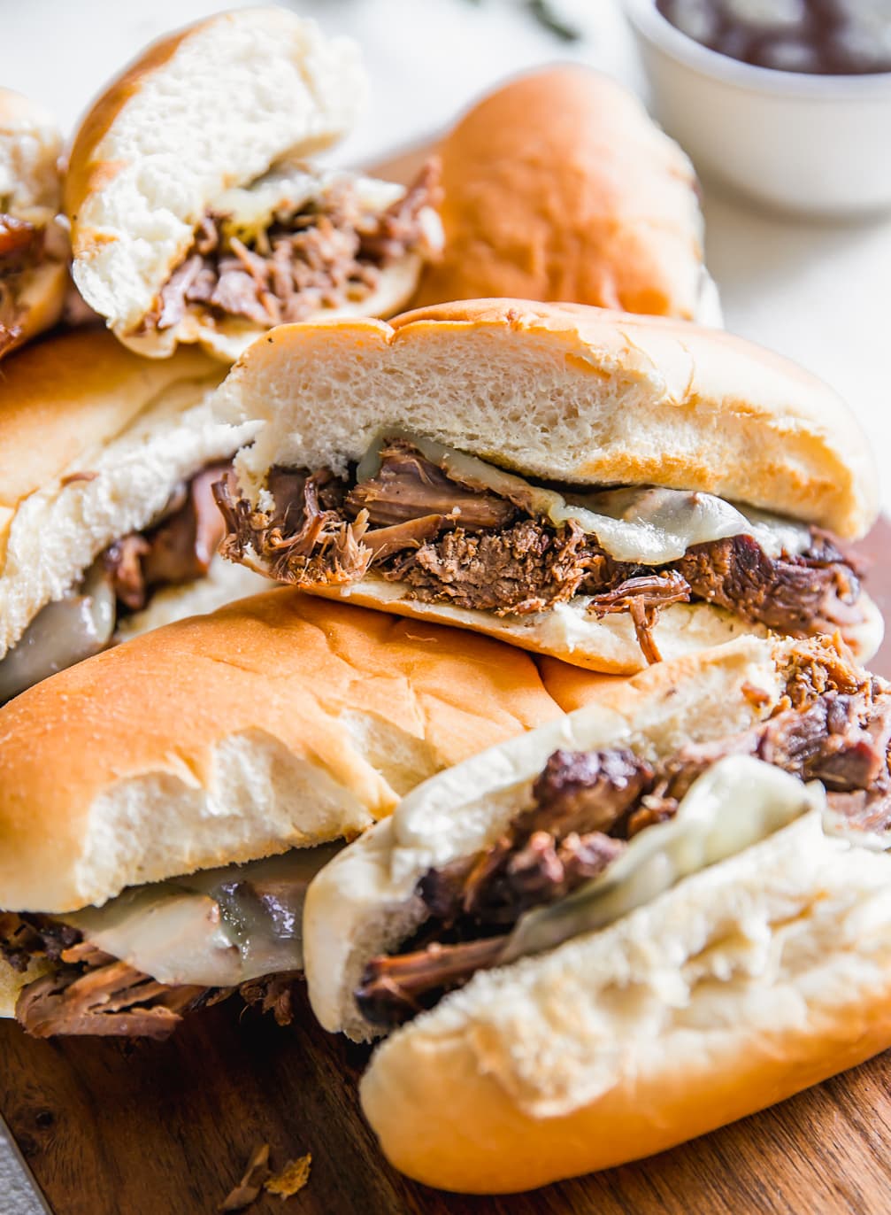 slow cooker french dip sandwiches with provolone cheese