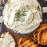 Boursin Cheese in a bowl with toasted bread