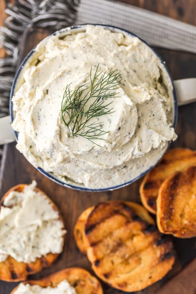 Boursin Cheese in a bowl with toasted bread.