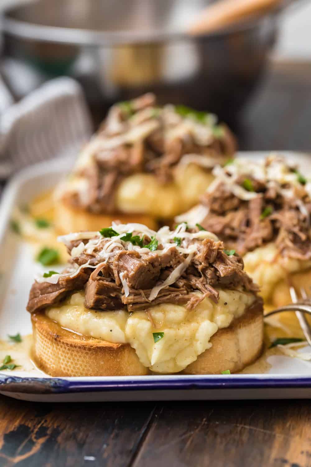 Close-up image of an Open-Faced Roast Beef Sandwich.