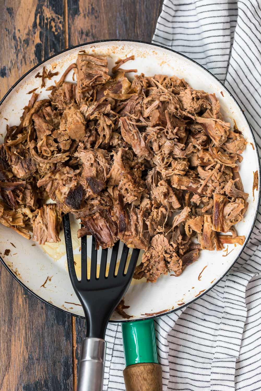 Image of shredded roast beef in a skillet.