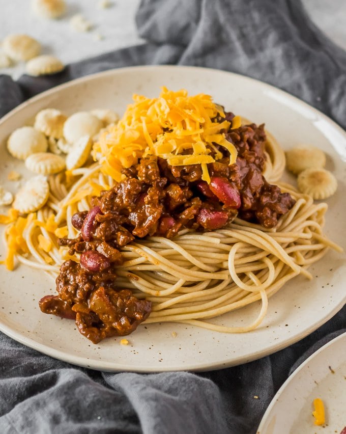 Close up of Cincinnati Chili with cheese and oyster crackers