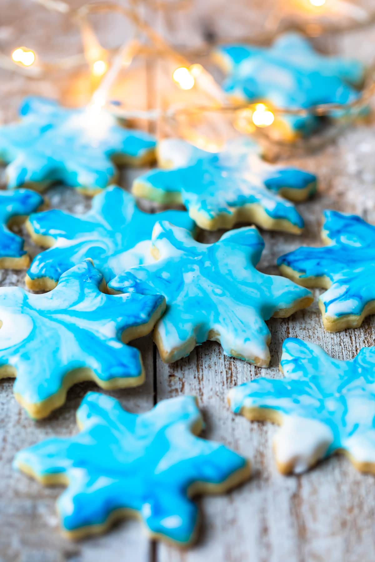 Snowflake butter cookies with blue confectioners sugar frosting