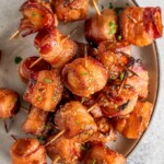 Bacon Wrapped Water Chestnuts are a simple and delicious appetizer for game day or any party. The soy-soaked water chestnuts are crunchy and flavorful, and once you add the bacon...yum! You can't go wrong with bacon wrapped appetizers. Try this bacon wrapped water chestnuts recipe right away!