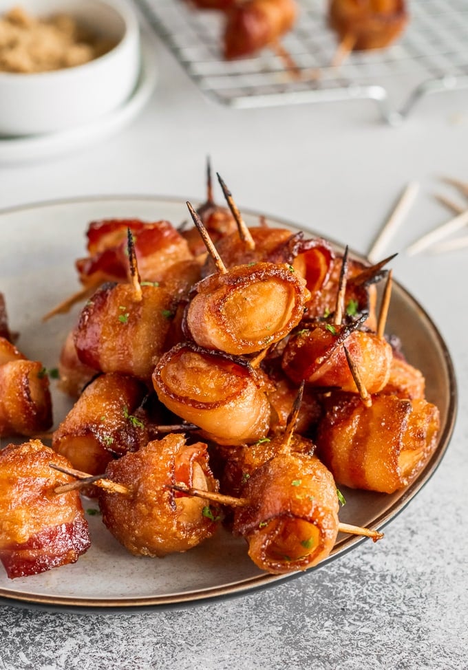 bacon wrapped appetizers on a plate