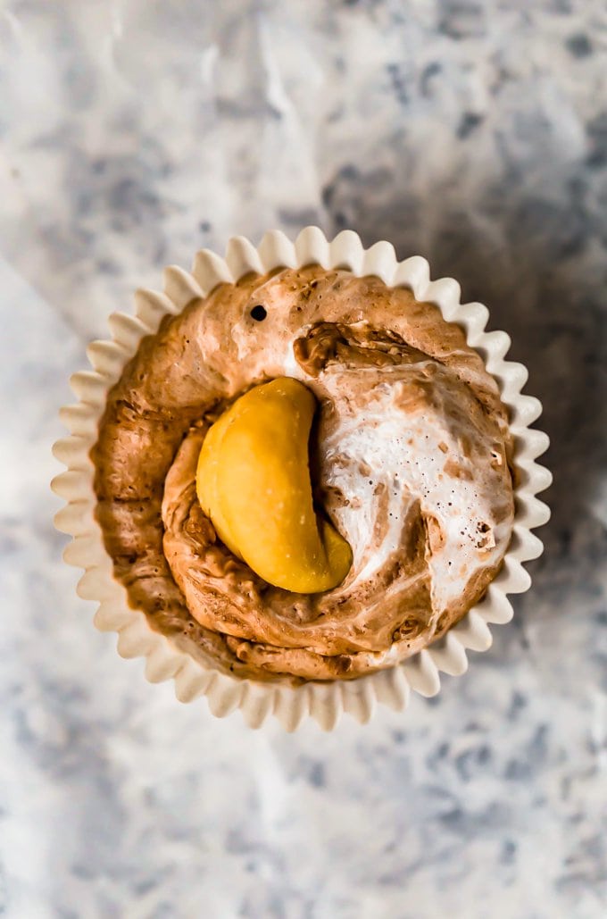 a mini cupcake sized piece of marshmallow creme fudge, in a cupcake wrapper