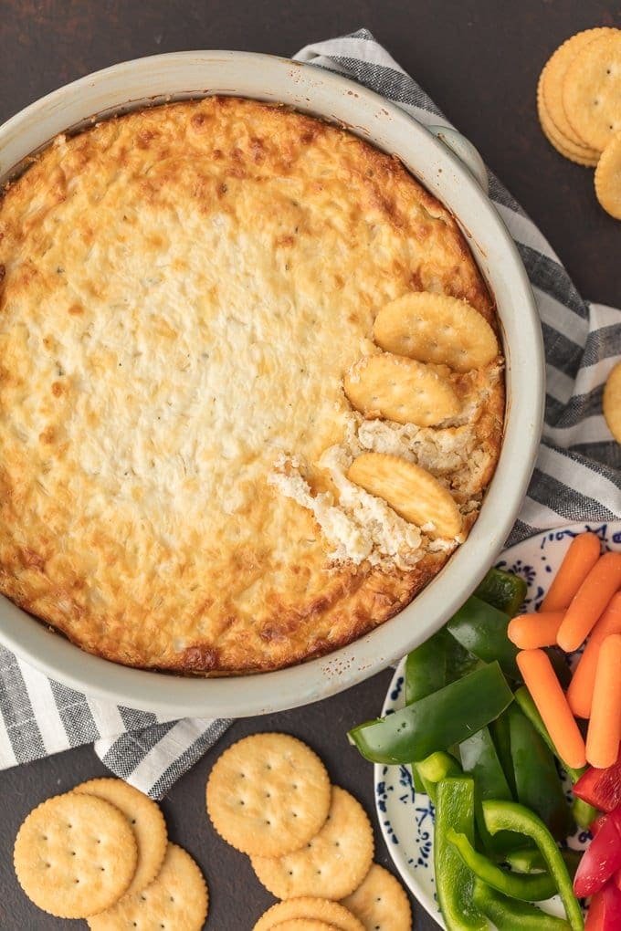 Best Hot Onion Dip Recipe, served with crackers and vegetables