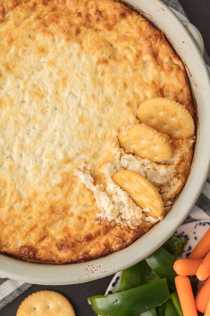 Crackers in hot onion dip