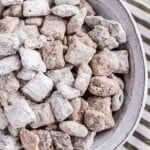 Puppy Chow is a chocolate-y treat that's sure to please! This easy puppy chow recipe includes an original version AND a mint chocolate puppy chow version. Find out how to make puppy chow for a simple yet delicious holiday treat!