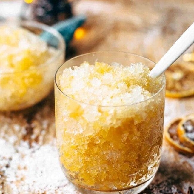 This Bourbon Slush cocktail drink is loved by all who come to my house on Christmas Eve. We have this Orange Bourbon Slush every year and it's such a fun and easy drink recipe, you have no reason not to try it!