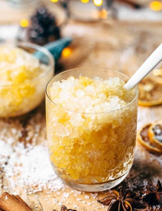 This Bourbon Slush cocktail drink is loved by all who come to my house on Christmas Eve. We have this Orange Bourbon Slush every year and it's such a fun and easy drink recipe, you have no reason not to try it!