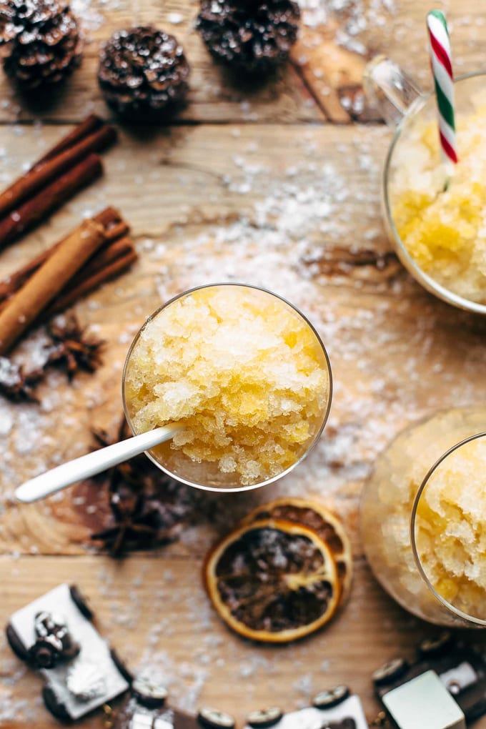 Overhead view of a glass filled with orange slushie