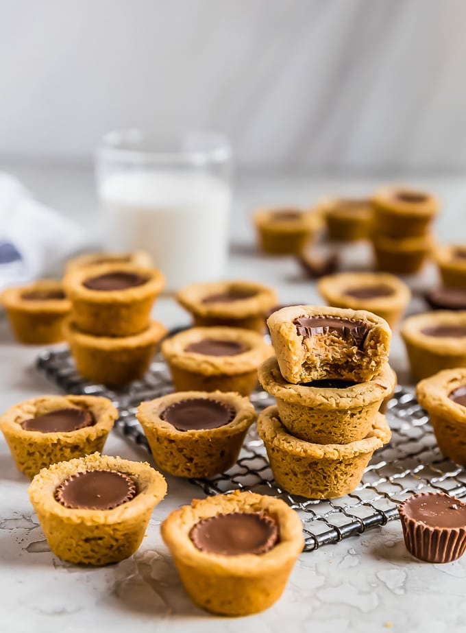 peanut butter cup cookies arranged on a cooling rack