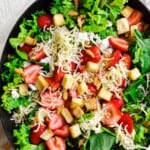 strawberry and goat cheese salad in a skillet.