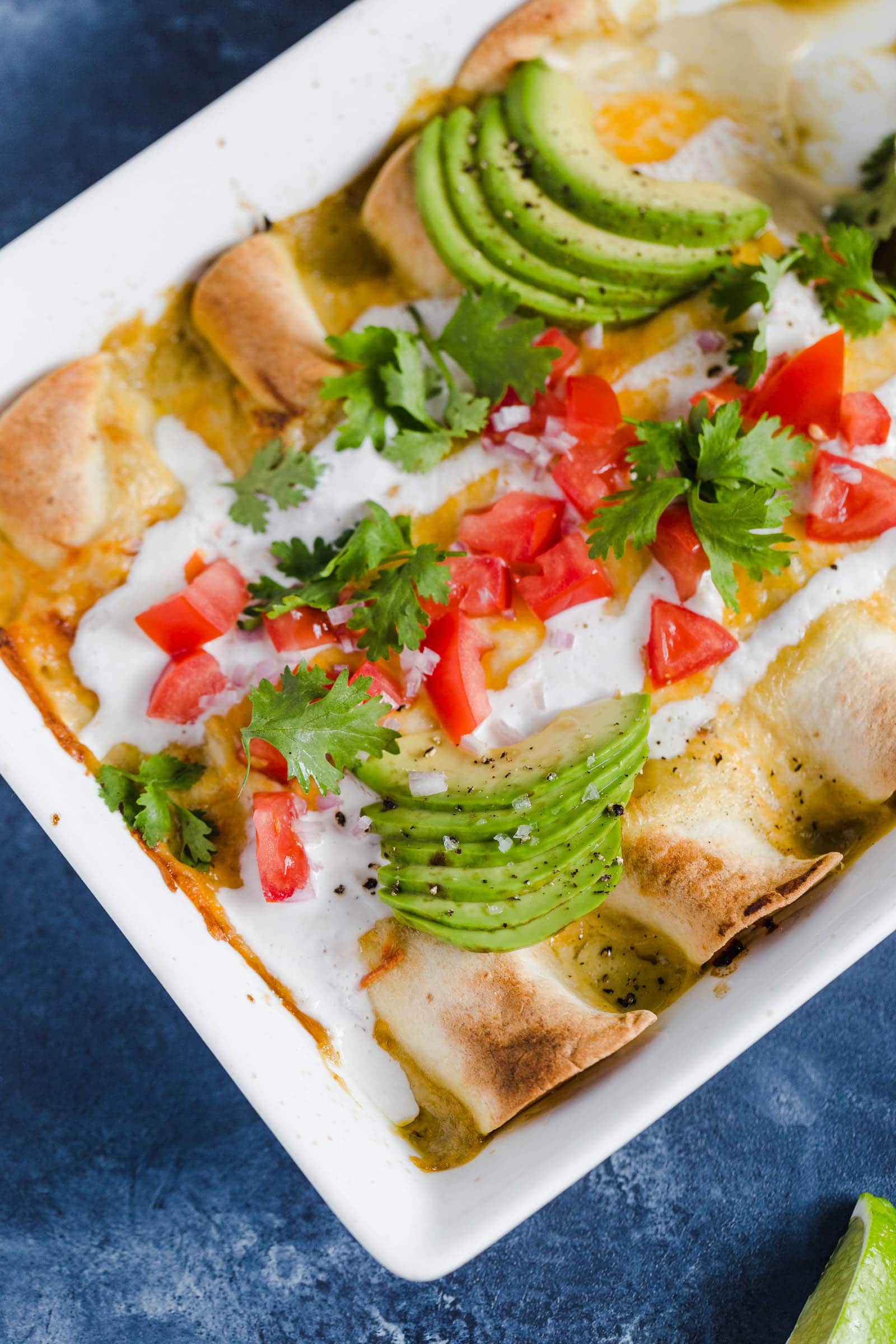A baking dish of chicken enchiladas