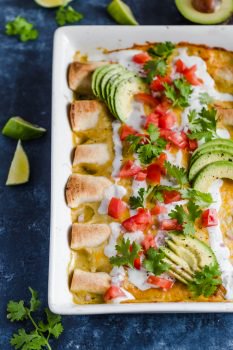 Honey Lime Chicken Enchiladas are a little bit sweet, a little bit spicy, and a whole lot of yummy! The chicken is marinated in a delicious honey lime mix, making the perfect base for these enchiladas. This easy chicken enchilada recipe is cheesy, flavorful, and fun. Try them out for your next dinner!