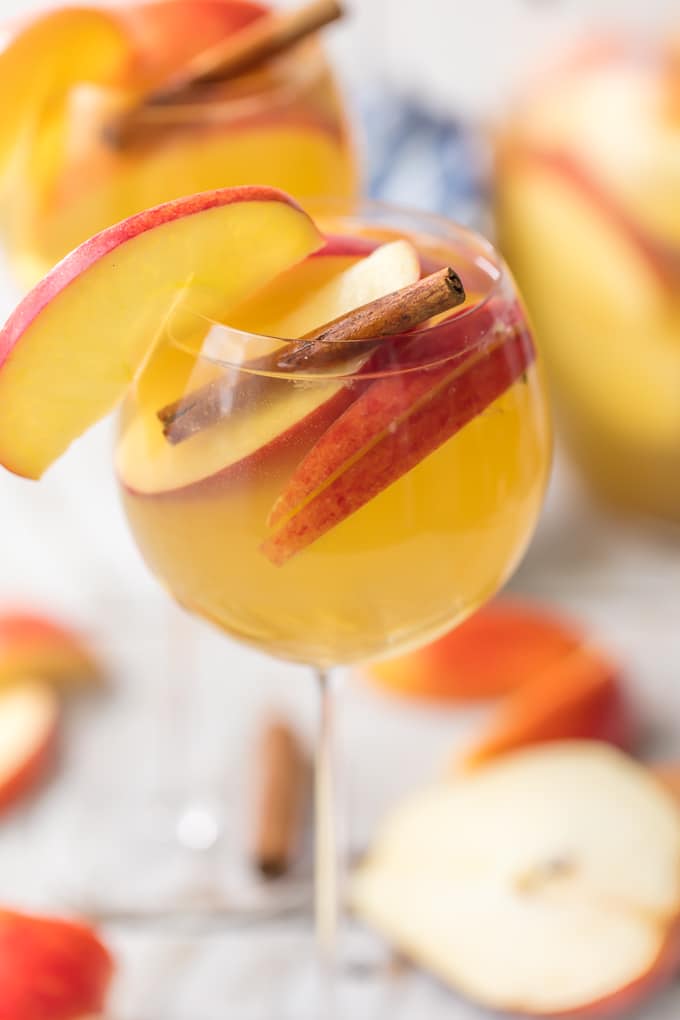 Apple Pie Sangria is light, refreshing, easy, and delicious! The hit of every party I take it to! Apple Cider, Caramel Vodka, White Wine, Ginger Ale, and more! The Cookie Rookie has Sangrias for every occasion!
