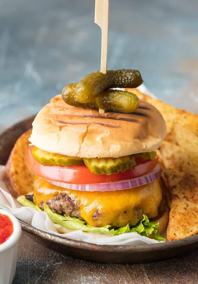 Stovetop Burgers are easier than you might think! Once we learned How to Cook Burgers on the Stove it's our go-to easy dinner for anytime of year. Cooking Burgers on the Stove is a great way to make sure you cook a JUICY and PERFECT Stovetop Burger each and every time. Hamburgers on the Stove is the only way to cook cheeseburgers! how to cook burgers on the stove - step by step