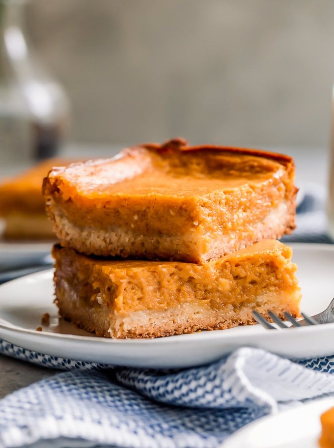 Two slices of Pumpkin Gooey Butter Cake on a plate