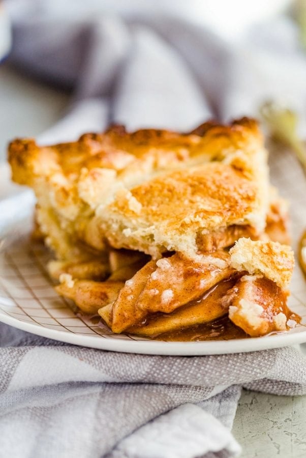 Homemade Apple Pie is one of the coziest, homiest desserts I can think of! Fresh, warm apple pie from scratch (with homemade apple pie crust) is the ideal Thanksgiving dessert. This easy homemade apple pie recipe makes it simple to bake a fresh pie for any occasion!