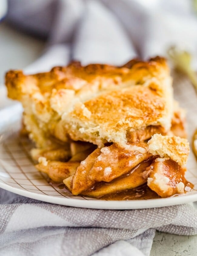Homemade Apple Pie is one of the coziest, homiest desserts I can think of! Fresh, warm apple pie from scratch (with homemade apple pie crust) is the ideal Thanksgiving dessert. This easy homemade apple pie recipe makes it simple to bake a fresh pie for any occasion!