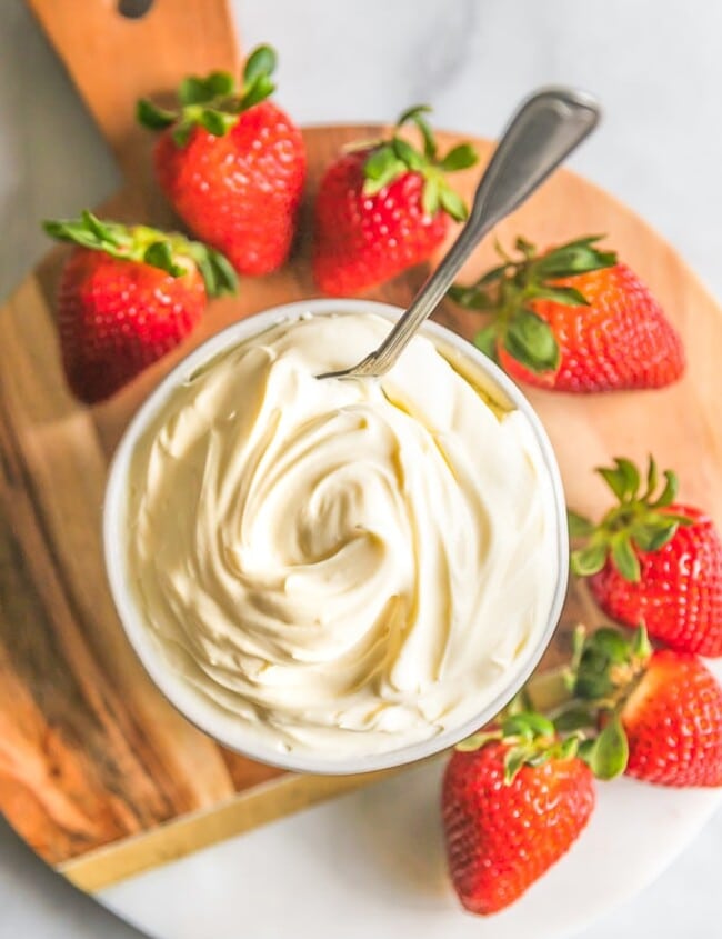 Mascarpone Cheese is a delicious and creamy Italian cheese used in such recipes as Tiramisu. Why buy it at the store when you can learn how to make Mascarpone Cheese at home! This Homemade Mascarpone Cheese Recipe is easy, cost effective, and SO DELICIOUS! We always have some of this Mascarpone Cheese Substitute on hand.