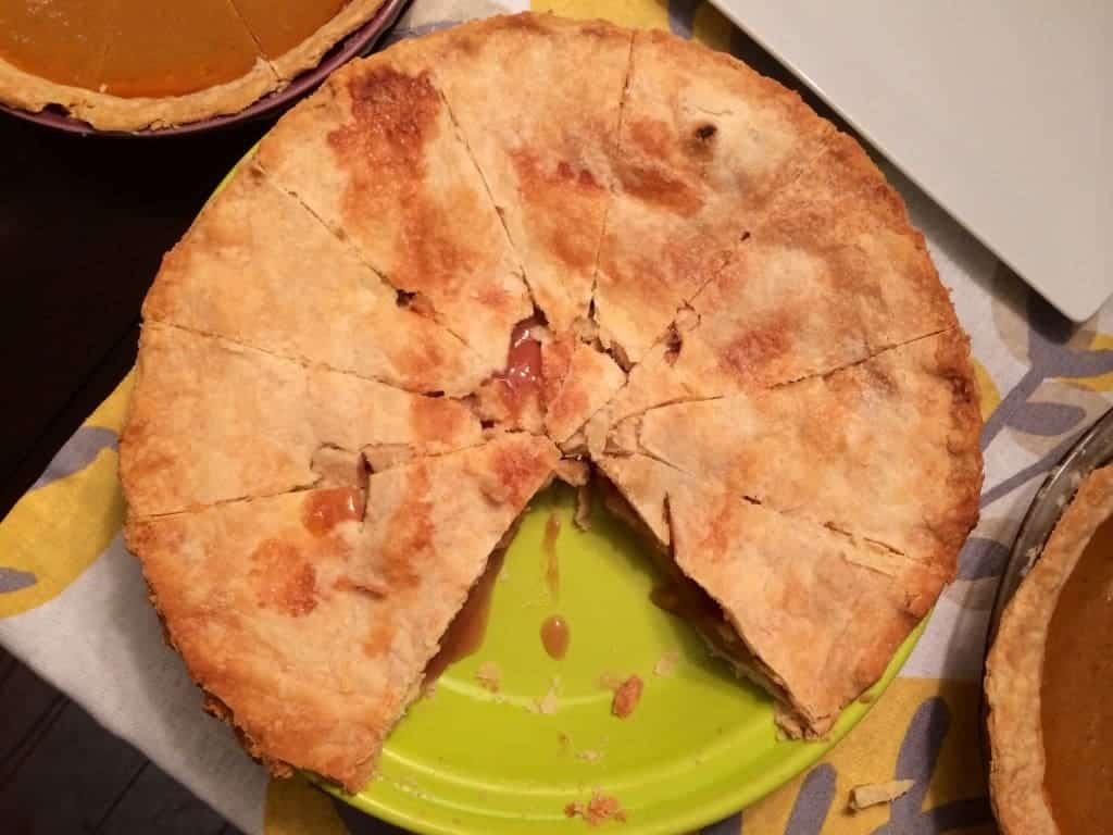 homemade pie with slices taken out
