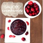 cranberry sauce on a white plate with cranberries.
