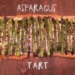 asparagus tart with balsamic glaze on a wooden table.