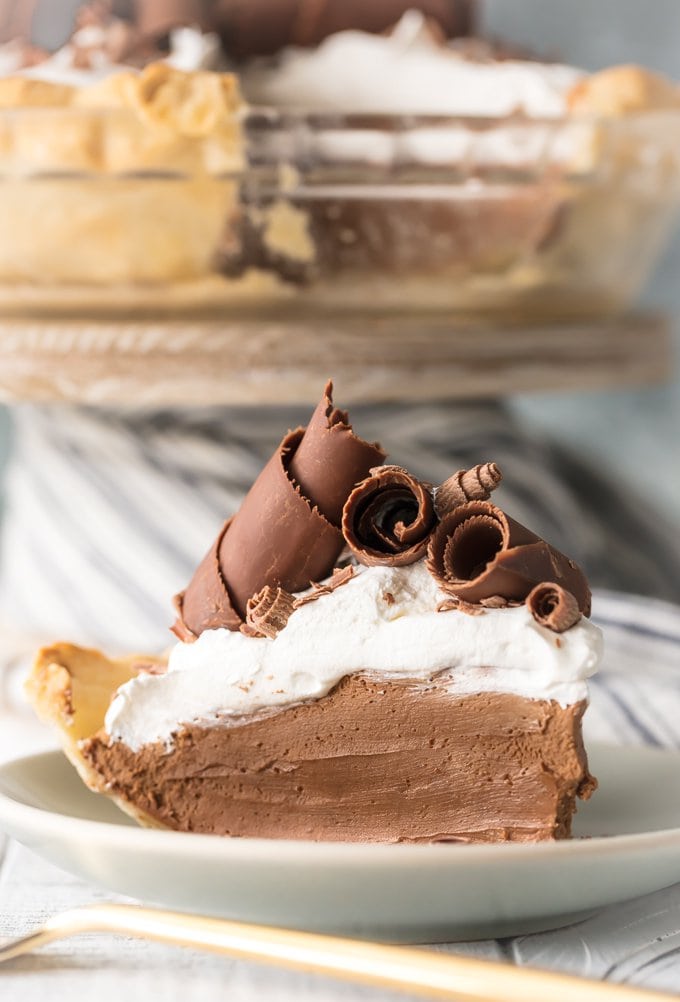 french silk pie recipe with large chocolate shavings and whipped cream