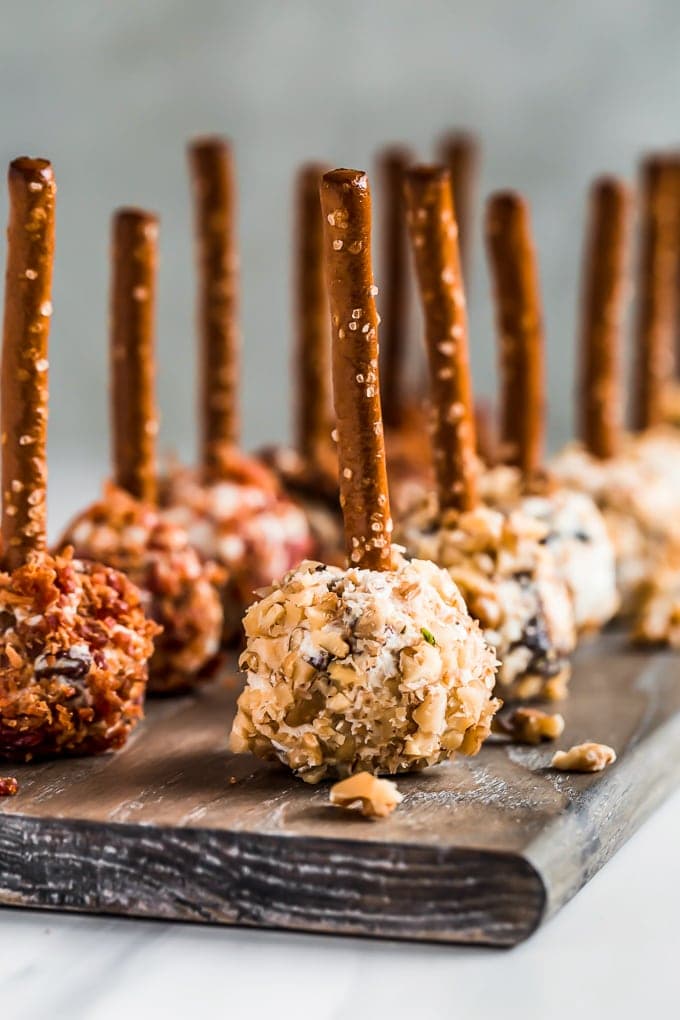 Cheese Ball Bites with pretzel sticks