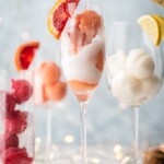 This is one of the BEST MIMOSA RECIPES for any brunch. It would even make a great dessert cocktail.  Sherbet Mimosas are a fun and creative way to dress up any mimosa recipe! Use the ice cream, sherbet, or sorbet flavor of your choice and mix with champagne. It's so fun, delicious, and beautiful! It's the perfect cocktail recipe to make for holidays, bridal showers, and beyond.