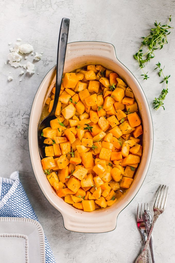 Baked Butternut Squash is such a simple side dish, but so delicious and healthy too. This maple-infused recipe is so sweet yet the broth balances it out perfectly. This maple roasted butternut squash recipe is easy to make, and you can also make a mashed version if you prefer. Pair it with your favorite main dish for dinner, or make this as the perfect Thanksgiving side dish! Maple Butternut Squash Recipe
