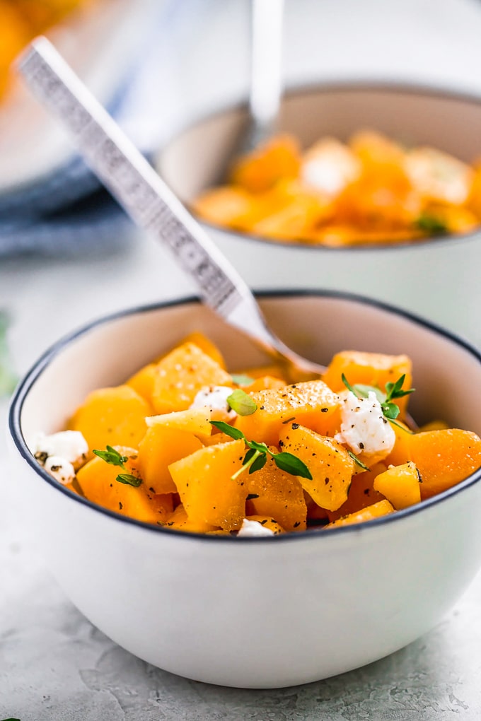 Baked Butternut Squash is such a simple side dish, but so delicious and healthy too. This maple-infused recipe is so sweet yet the broth balances it out perfectly. This maple roasted butternut squash recipe is easy to make, and you can also make a mashed version if you prefer. Pair it with your favorite main dish for dinner, or make this as the perfect Thanksgiving side dish! A bowl of baked butternut squash