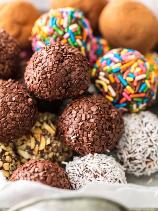 Chocolate Truffles are a must make recipe for any chocolate lover. This Easy Chocolate Truffle Recipe is made with only 5 ingredients and has a unique and amazing flavor. If you've wondered how to make chocolate truffles, this recipe is for you. Softer than fudge, bite-sized, and utterly perfect; this is a chocolate dessert recipe you simply can't miss.