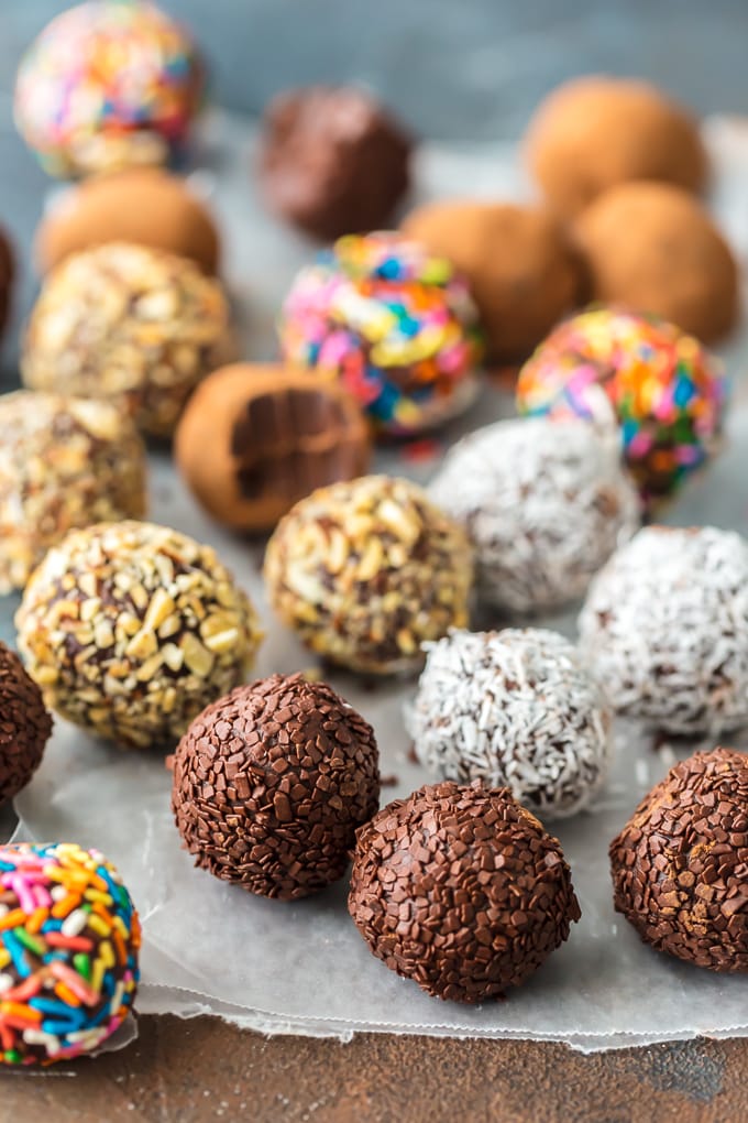 chocolate truffles recipe with nuts, coconut, sprinkles, and chocolate shavings