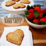 strawberry hand tarts on a white plate.