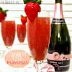 strawberry mimosas and a champagne bottle