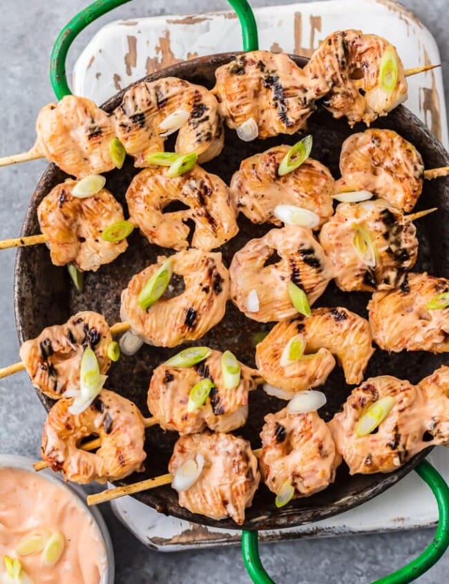 This BANG BANG SHRIMP RECIPE is loaded with flavor but low on calories! It's a skinny version of the popular Bonefish Grill appetizer and you'll love the spicy but creamy bang bang sauce. Delicious, easy, and crave worthy. This is a delicious appetizer or dinner the entire family will ask for again and again. This Skinny Copycat Bang Bang Shrimp Recipe will be an instant healthy favorite for your family!