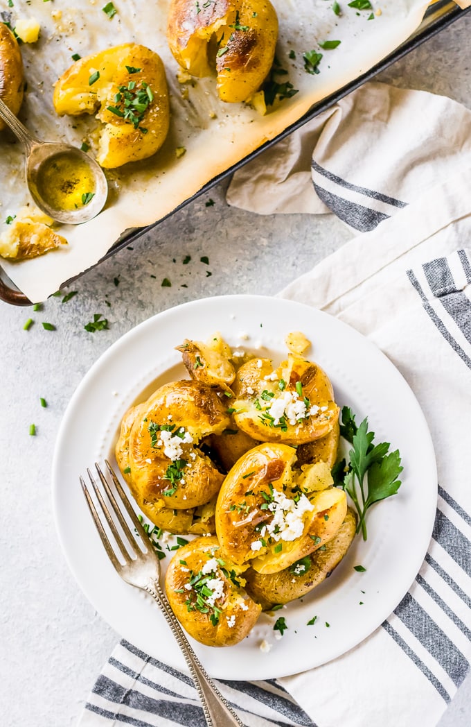 smashed potatoes on a plate