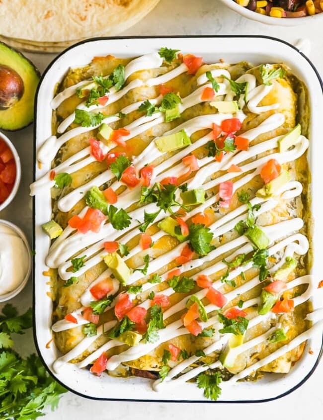 sweet potato enchiladas with chicken in a white dish
