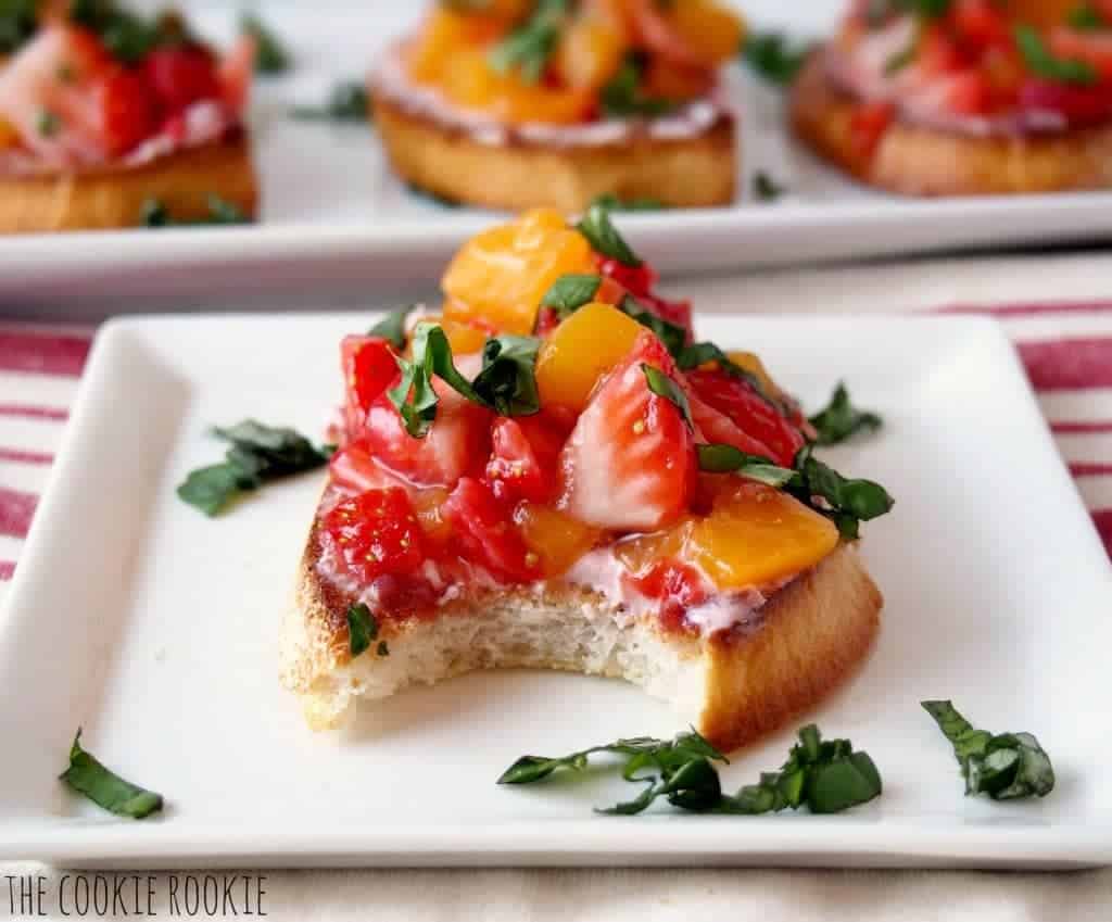 Peach and Strawberry Bruschetta with bite taken out.