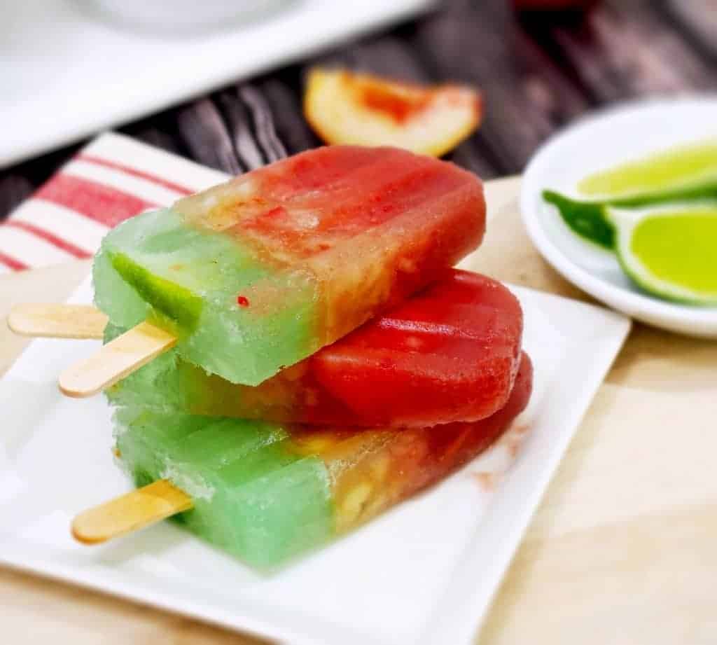 A stack of Margarita Popsicles on a plate.